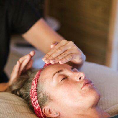 Relaxed woman getting alternative massage